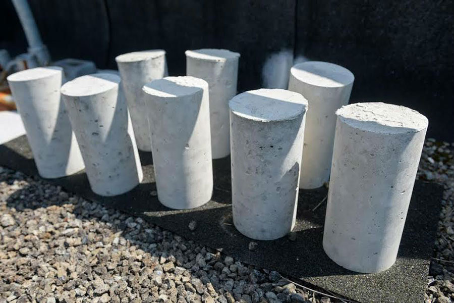 a set of several concrete cylinders