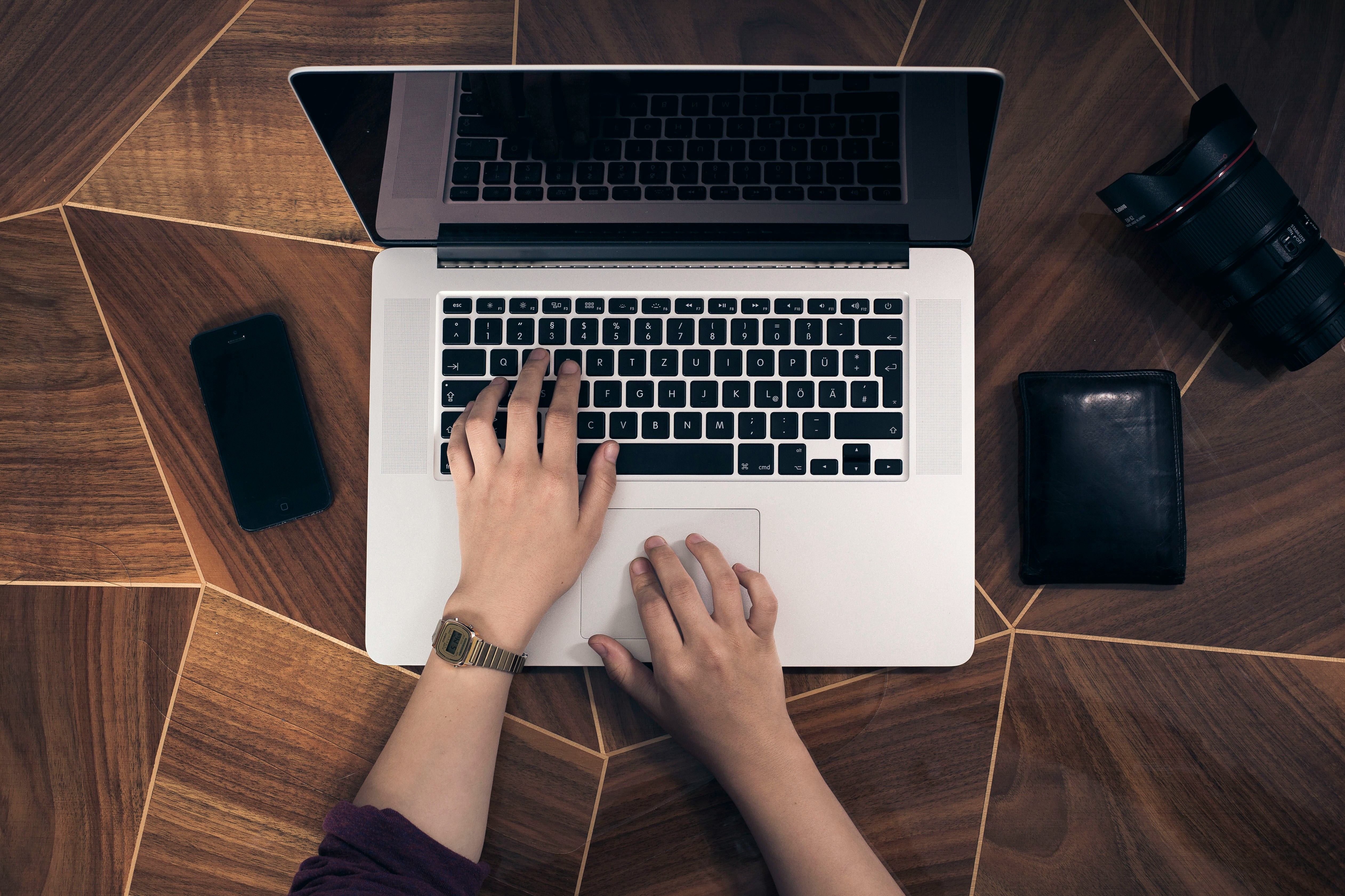 High-angle of person working at a laptop