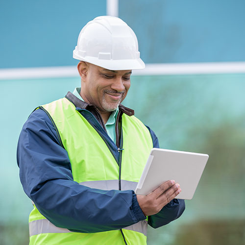 Man reviewing information on his tablet